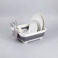 A rectangular collapsible plastic tray or organizer with a white outer frame and a dark gray inner compartment, shown on a plain white background.