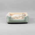 Comfortable pet bed with fluffy interior on a soft surface, labeled 'Comfortable and soft'.