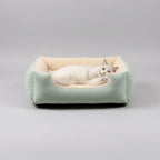 Comfortable pet bed with fluffy interior on a soft surface, labeled 'Comfortable and soft'.