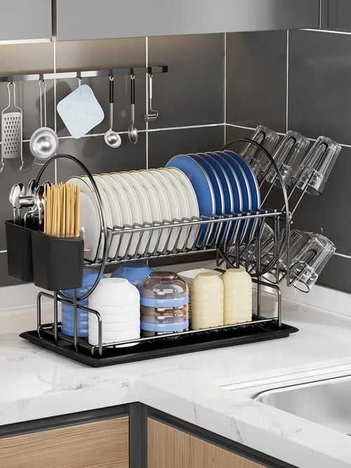 Dish drying rack with dishes on a kitchen counter