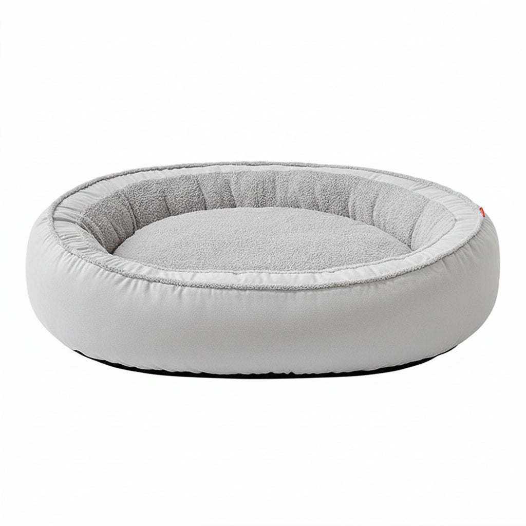 Gray pet bed with a brand logo on a white background