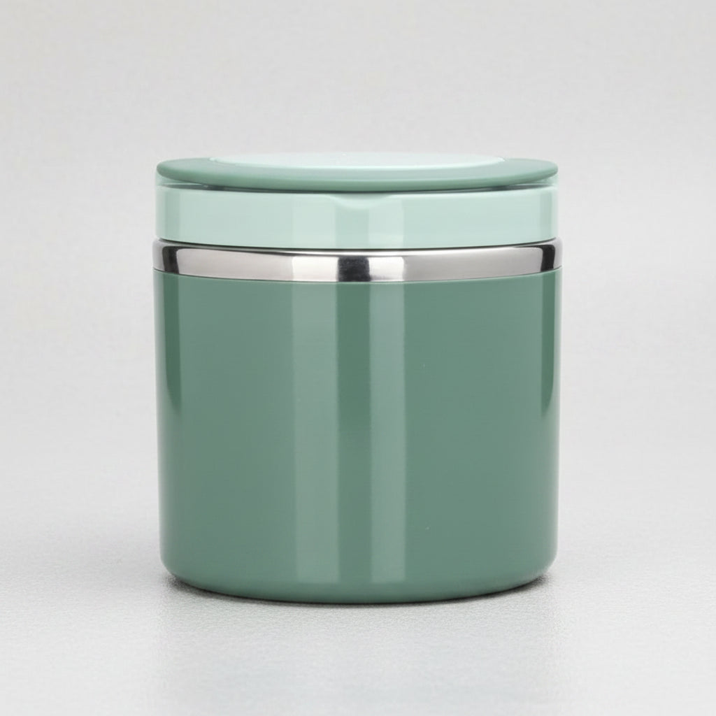 Green container with silver lid on a white background