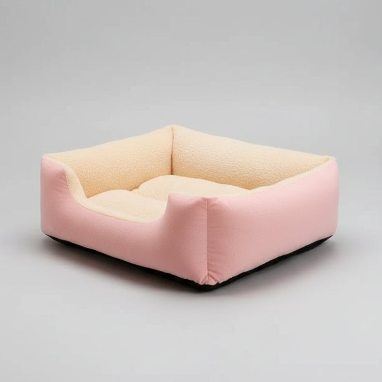 Pink and beige pet bed on a fluffy carpet