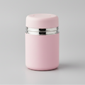 Pink container with silver lid on a white background