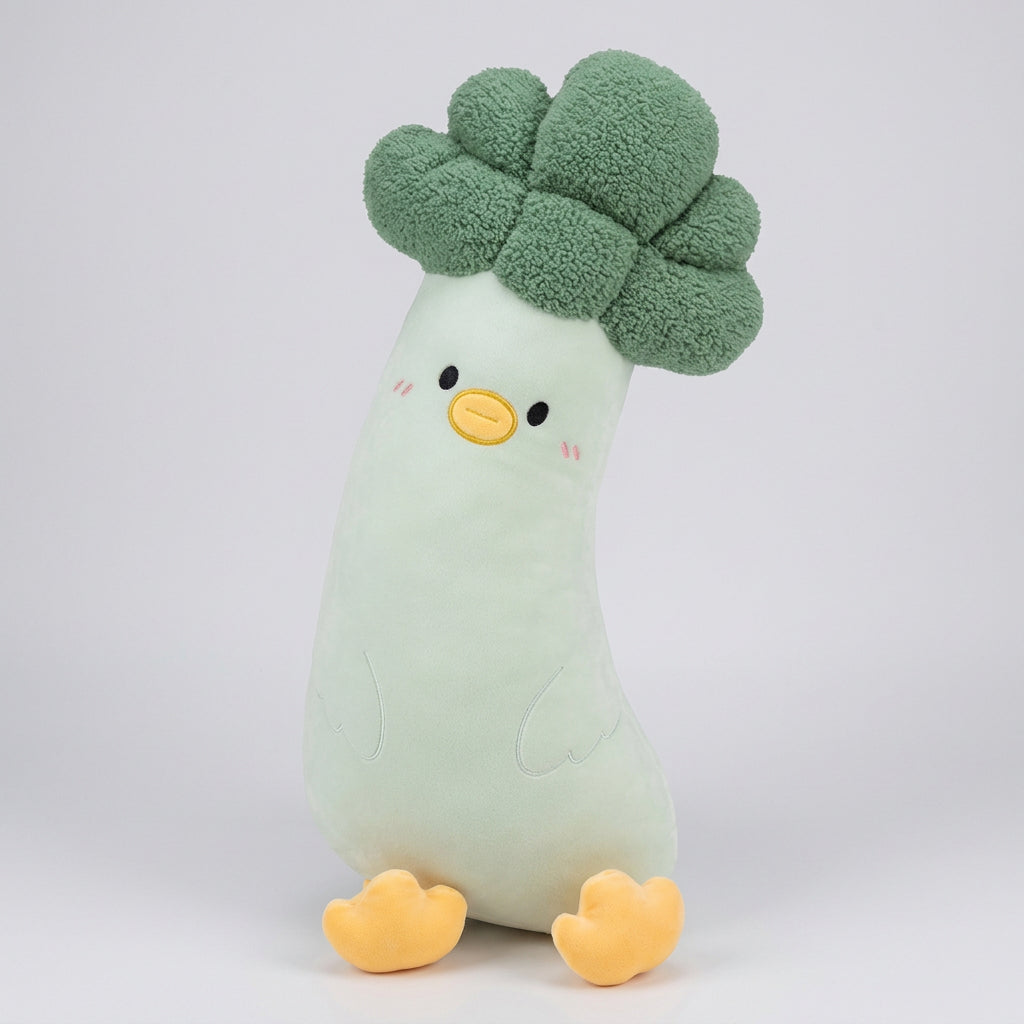 Plush toy shaped like a broccoli with a white stem and green florets on a white background