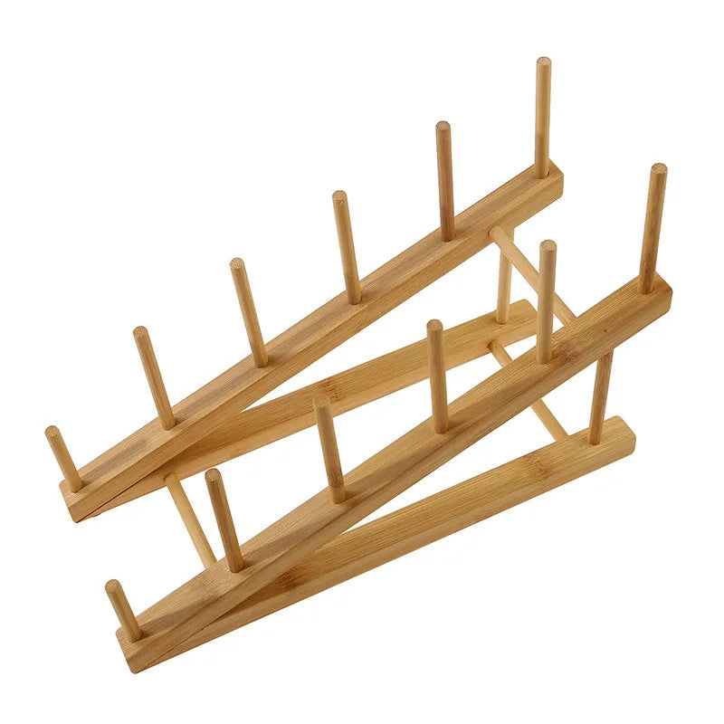 Wooden dish drying rack on a white background